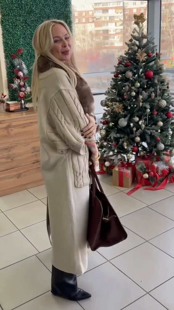 Cable-knit poncho coat